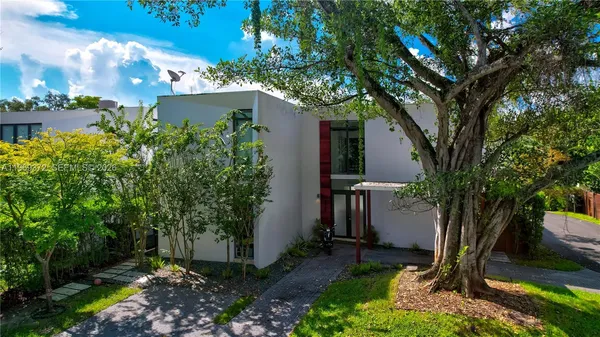 a balcony view with a sitting space