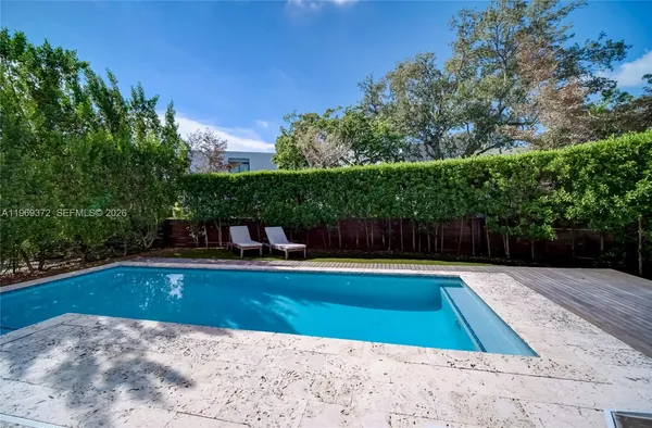 a living room with a couch and a fireplace