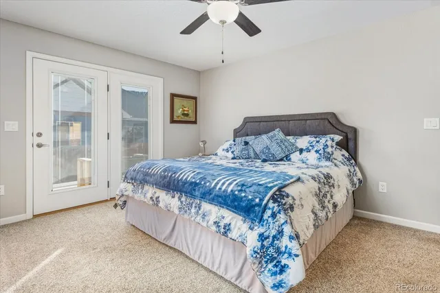 a bedroom with a bed and dresser