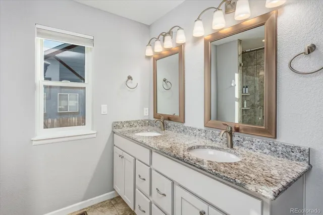 a bathroom with a tub and a window