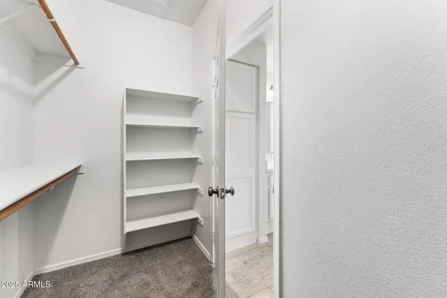 a view of a room with rack on the wall