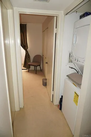 a bedroom with two beds and painted walls