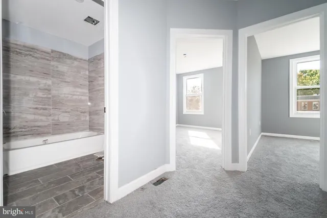 a view of an empty room and window