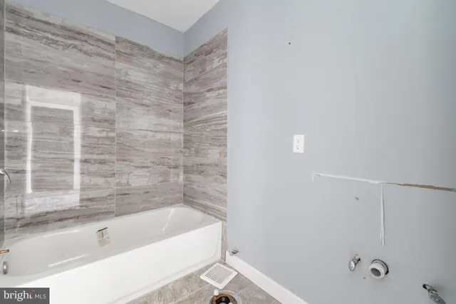 a bathroom with a bathtub