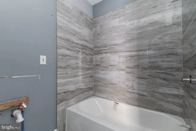 a view of an empty room and closet