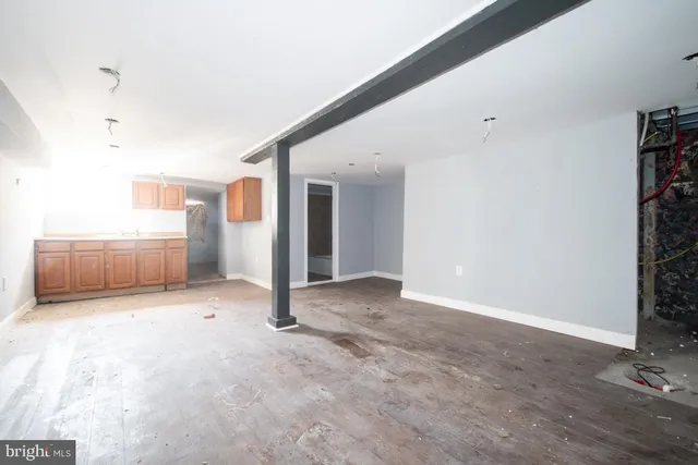 a view of a room with a hallway