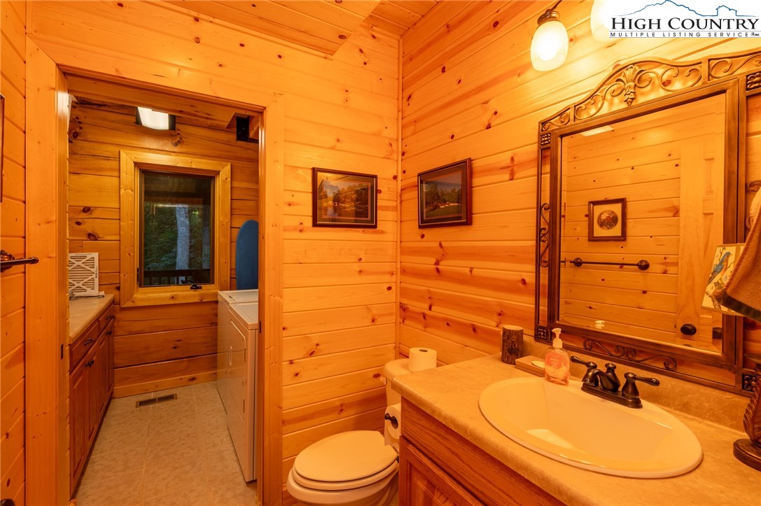 160 Capote Court Boone, NC 28607 - Photo 17 of 45 a bathroom with a sink a toilet and shower