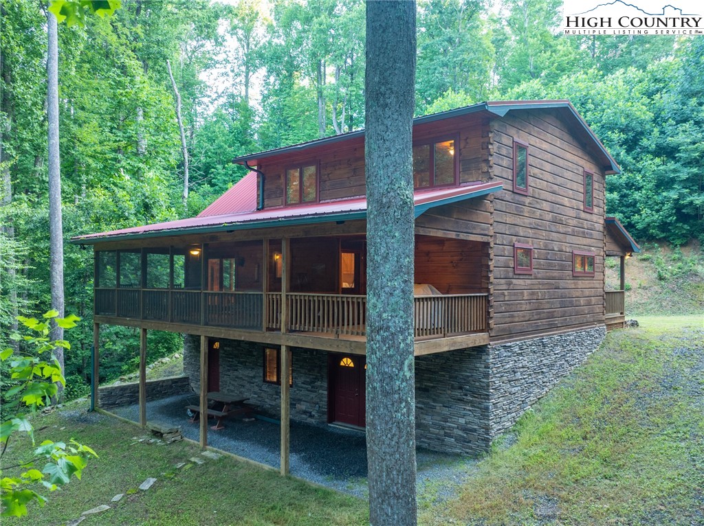 160 Capote Court Boone, NC 28607 - Photo 18 of 45 a front view of a house with a balcony