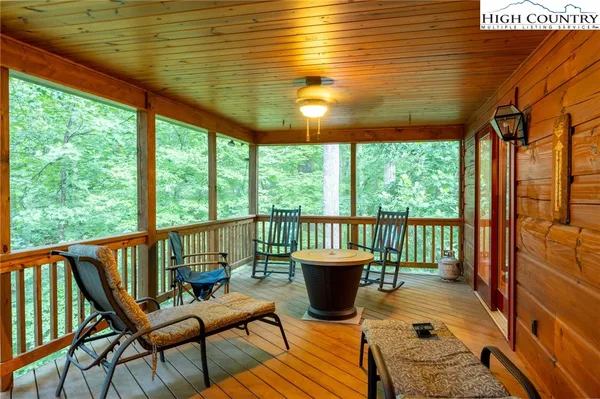 a view of a two chairs in the deck