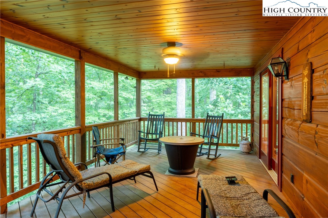 160 Capote Court Boone, NC 28607 - Photo 19 of 45 a balcony with chairs and a table