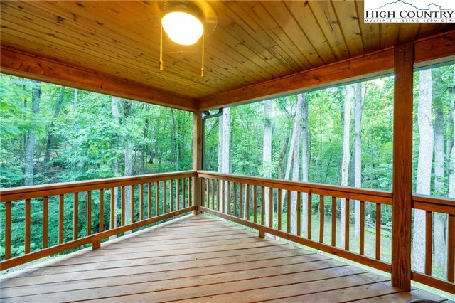 a view of a two chairs in the deck