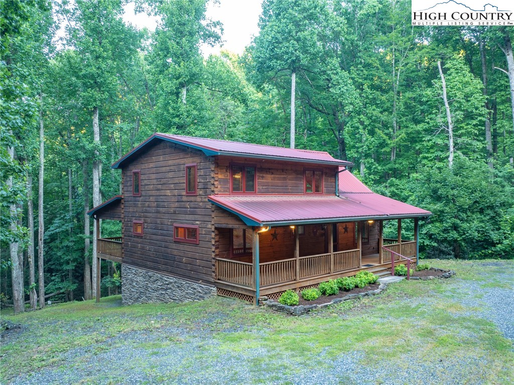 160 Capote Court Boone, NC 28607 - Photo 2 of 45 a view of a house with a yard