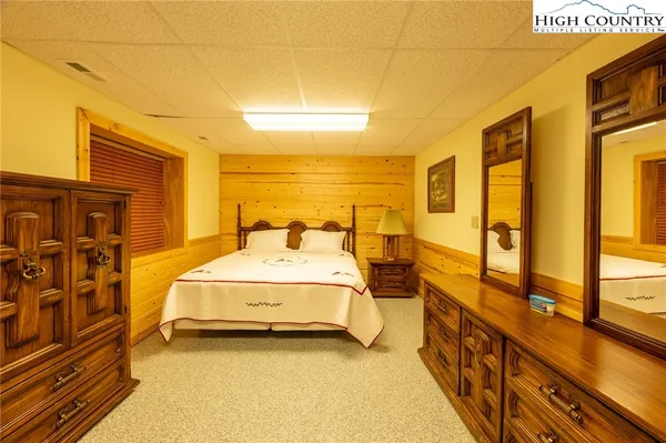 a view of a house with a yard and plants