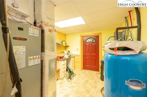 a view of a house with a small deck