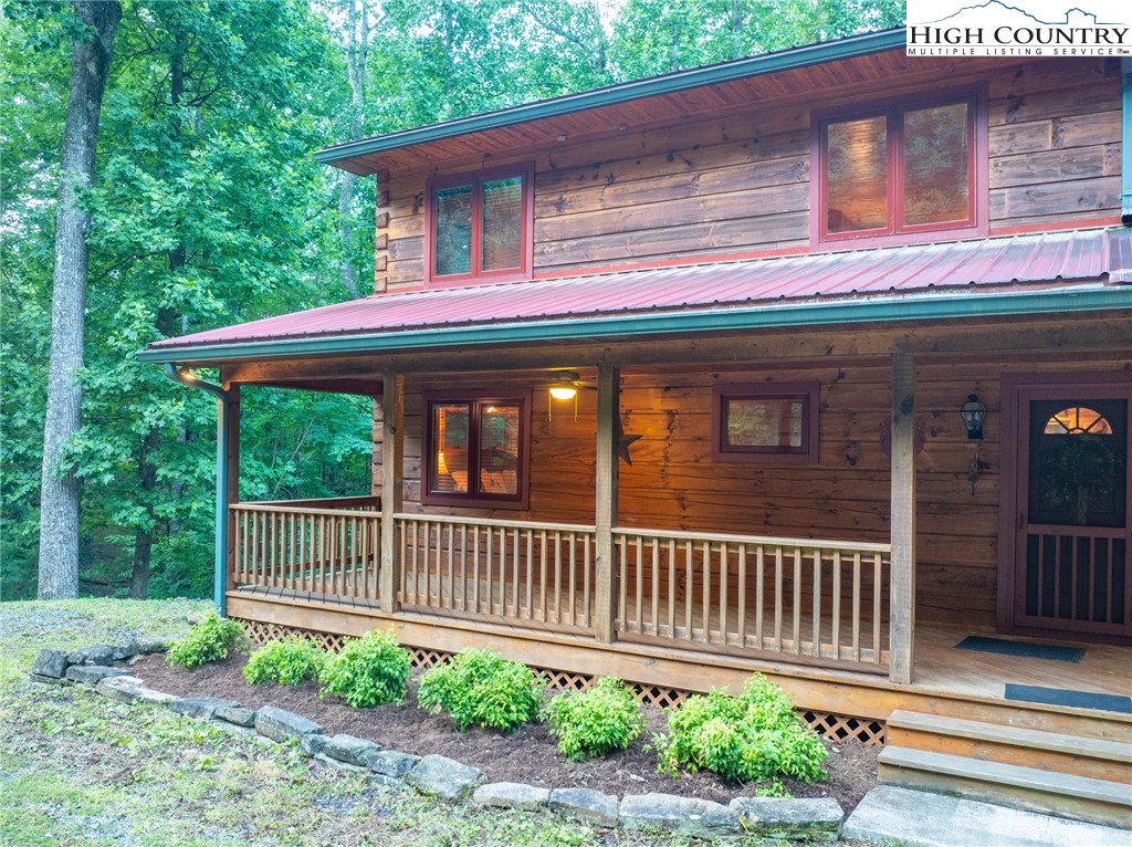 160 Capote Court Boone, NC 28607 - Photo 40 of 45 a view of a house with a small deck