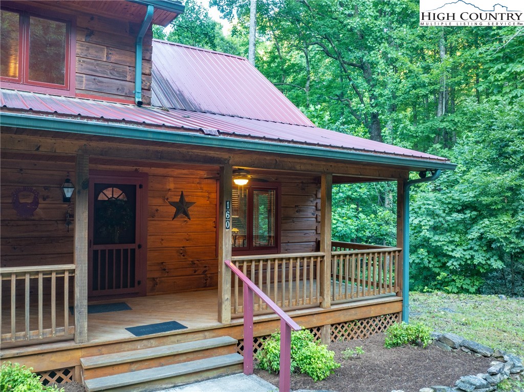 160 Capote Court Boone, NC 28607 - Photo 41 of 45 a view of a deck with a large window