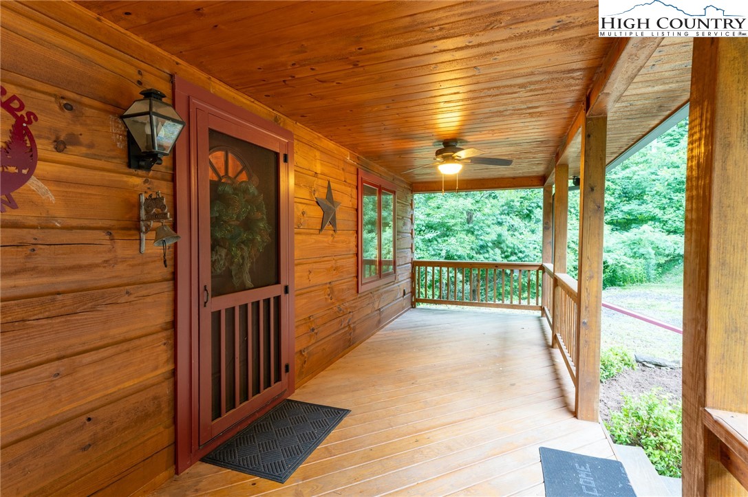 160 Capote Court Boone, NC 28607 - Photo 5 of 45 a view of a porch with wooden floor and outdoor space