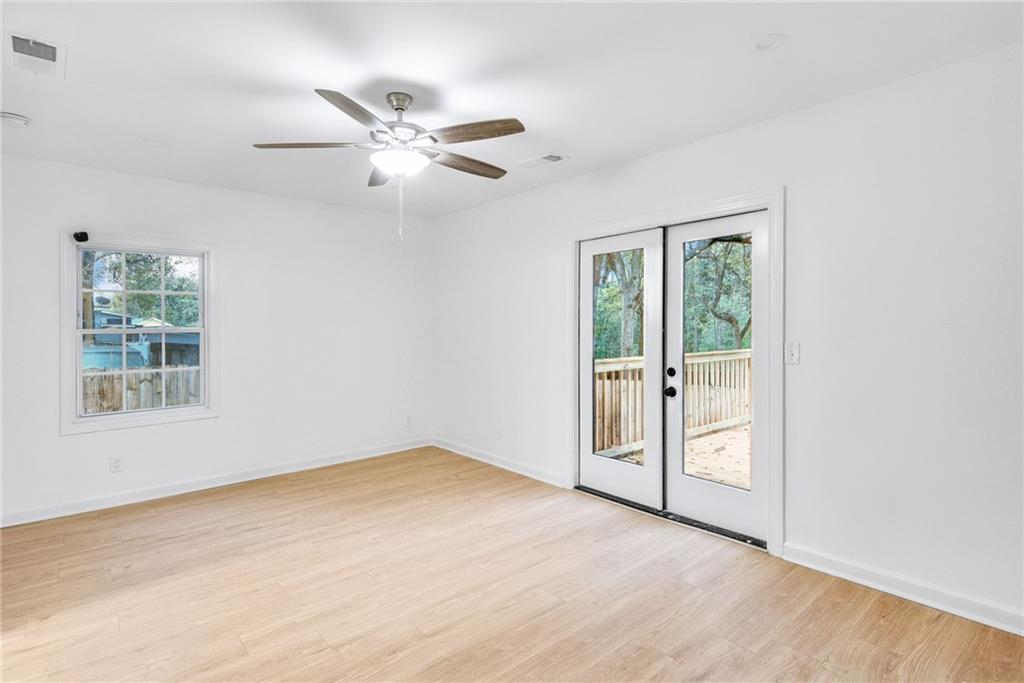 1967 Browns Mill Road Southeast Atlanta, GA 30315 - Photo 15 of 35 a view of an empty room with a window