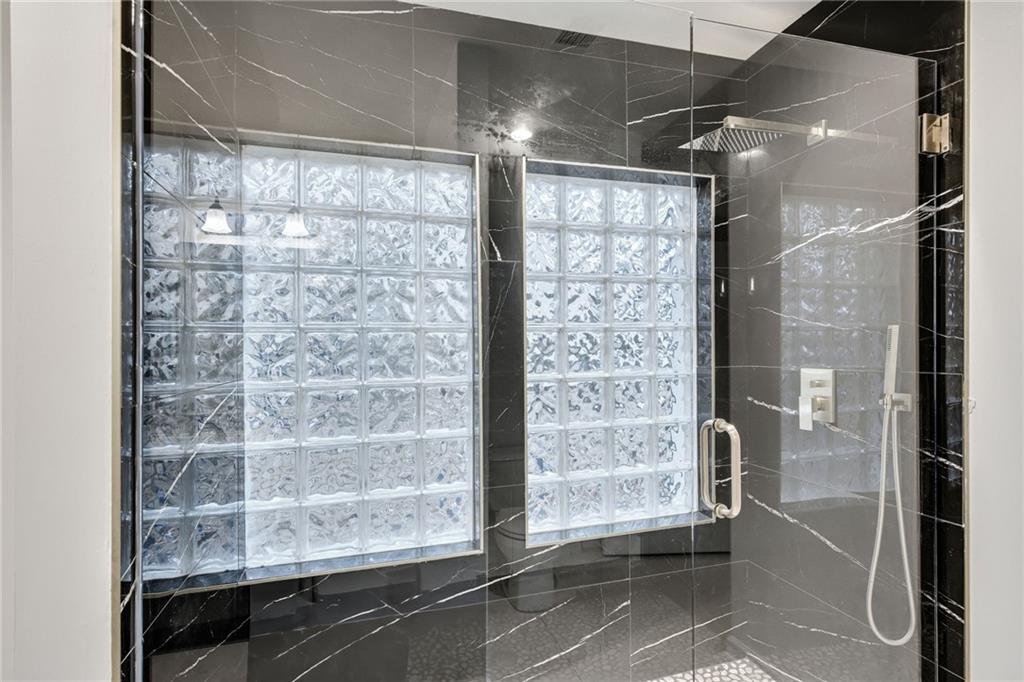 1967 Browns Mill Road Southeast Atlanta, GA 30315 - Photo 24 of 35 a view of a glass door with a glass door