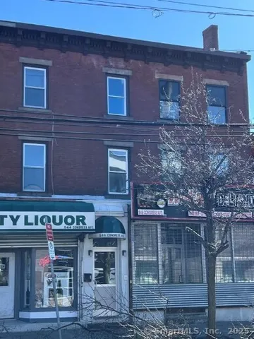 a front view of a building with glass windows