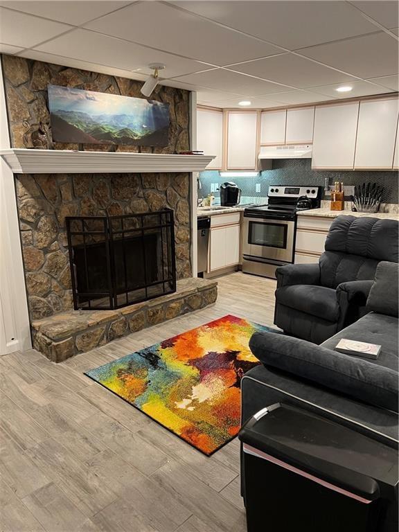 1638 Dunwoody Square, Unit A Dunwoody, GA 30338 - Photo 1 of 12 a living room with furniture and a fireplace