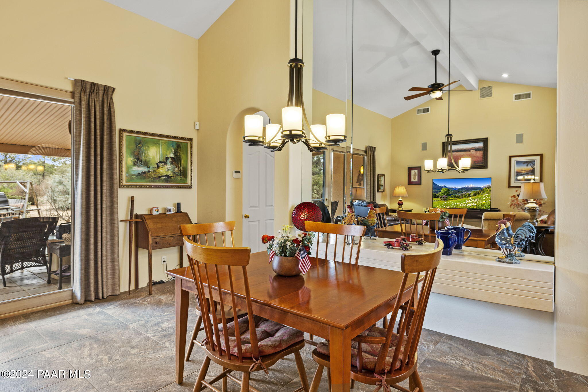 2147 West Post Oak Drive Prescott, AZ 86305 - Photo 9 of 59 a view of a dining room with furniture and a chandelier