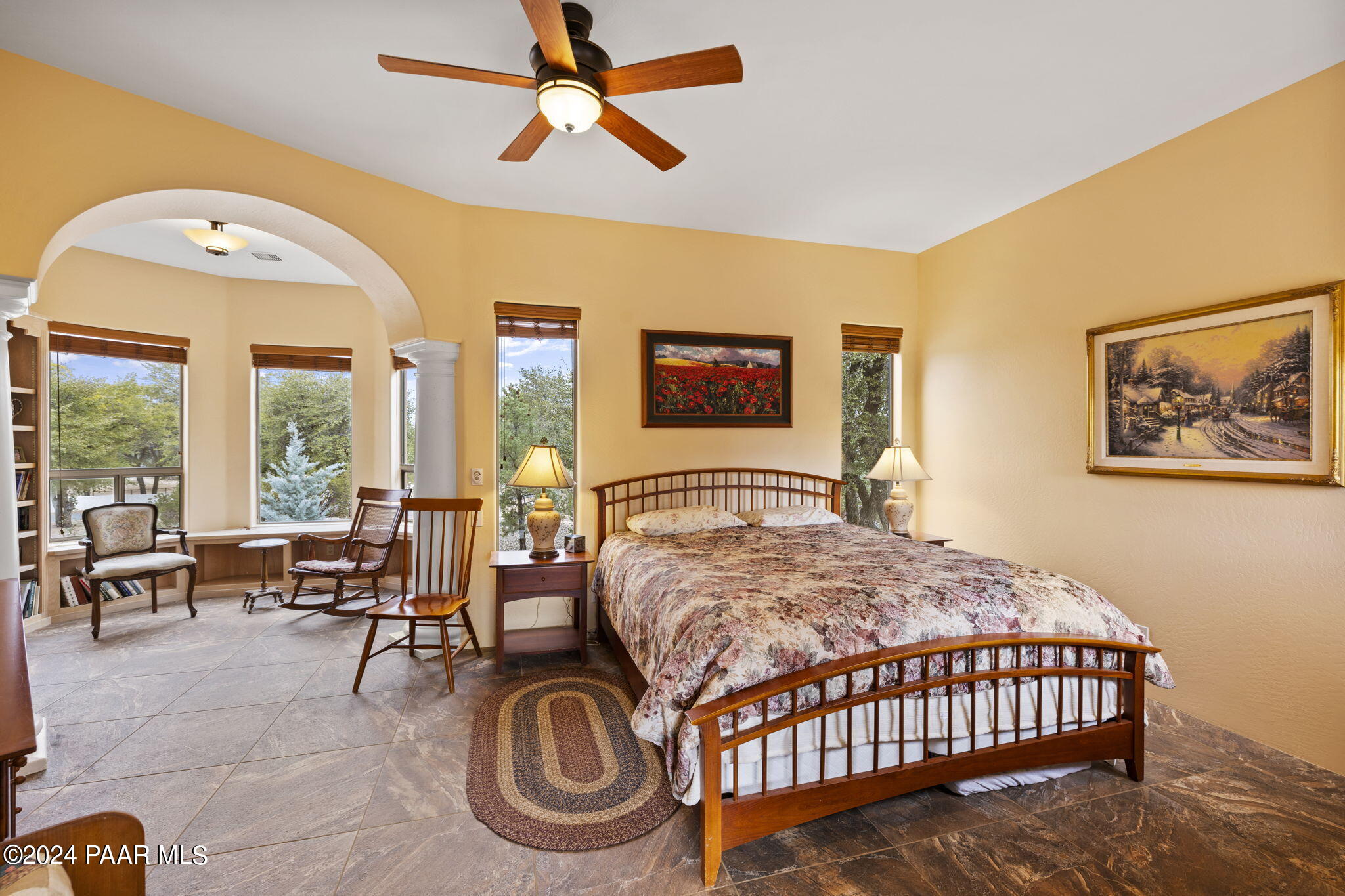 2147 West Post Oak Drive Prescott, AZ 86305 - Photo 22 of 59 a living room with a bed furniture and a large window