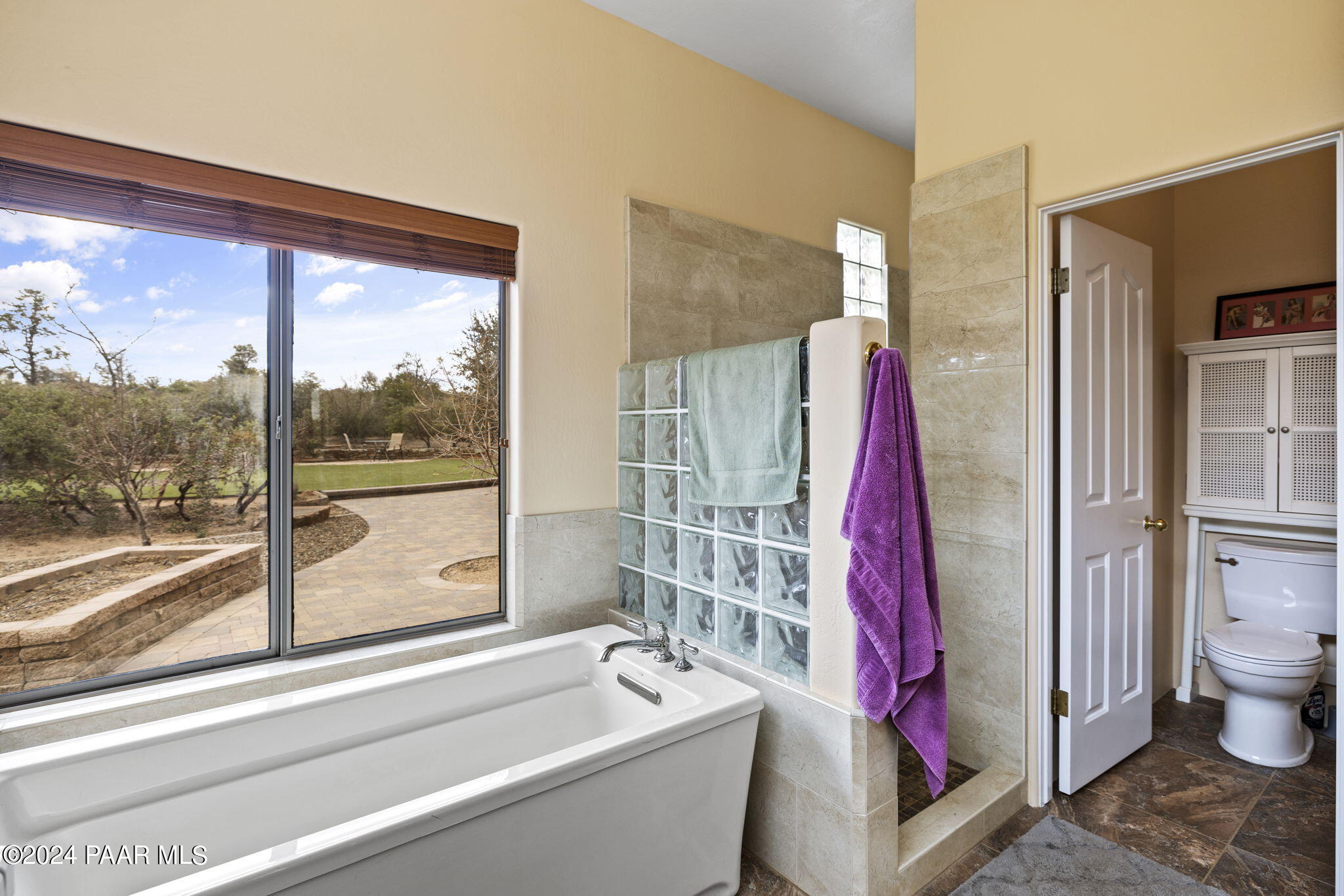 2147 West Post Oak Drive Prescott, AZ 86305 - Photo 29 of 59 a bath room with a bath tub and a shower