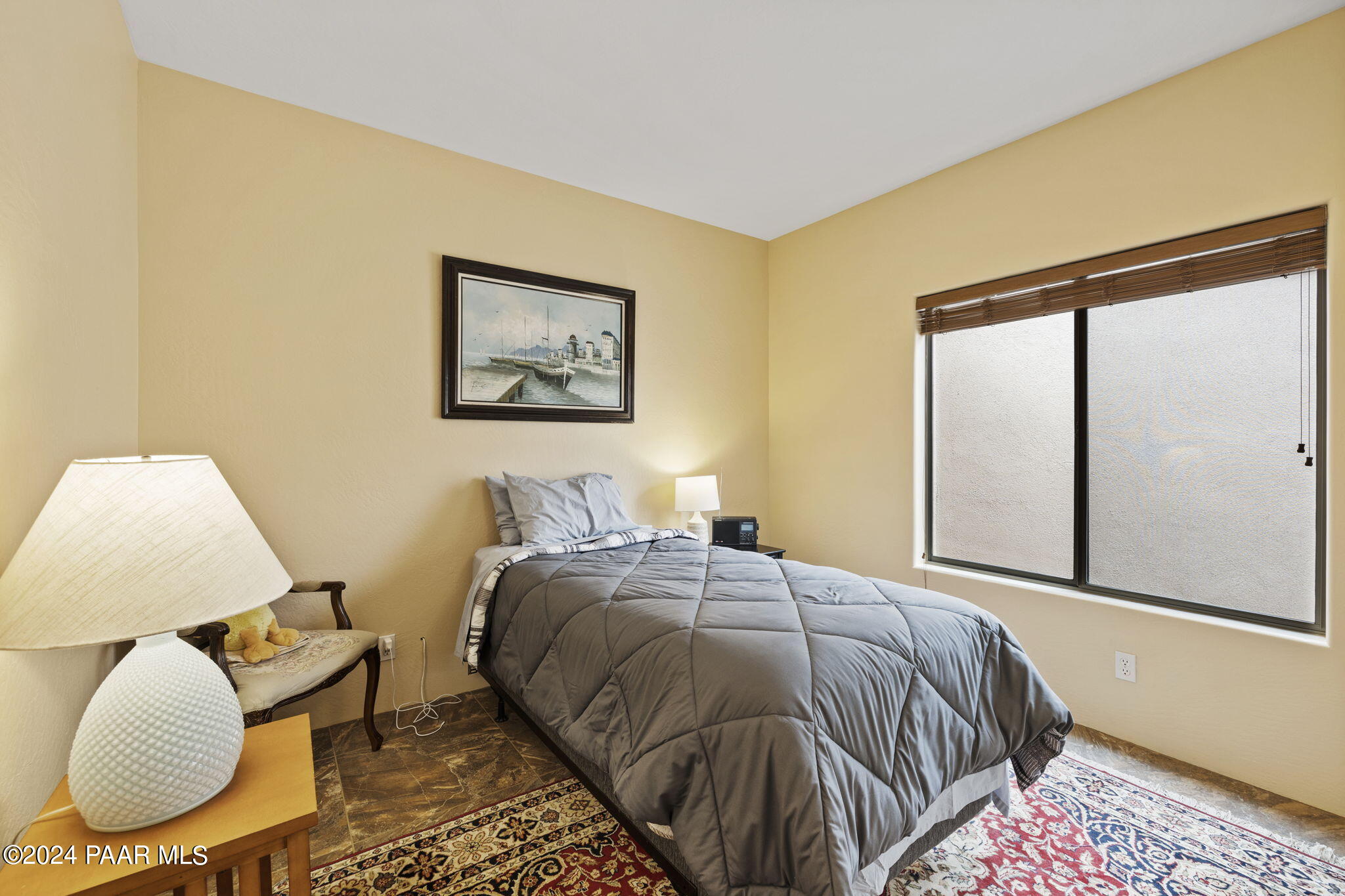 2147 West Post Oak Drive Prescott, AZ 86305 - Photo 31 of 59 a bedroom with a bed and cupboard