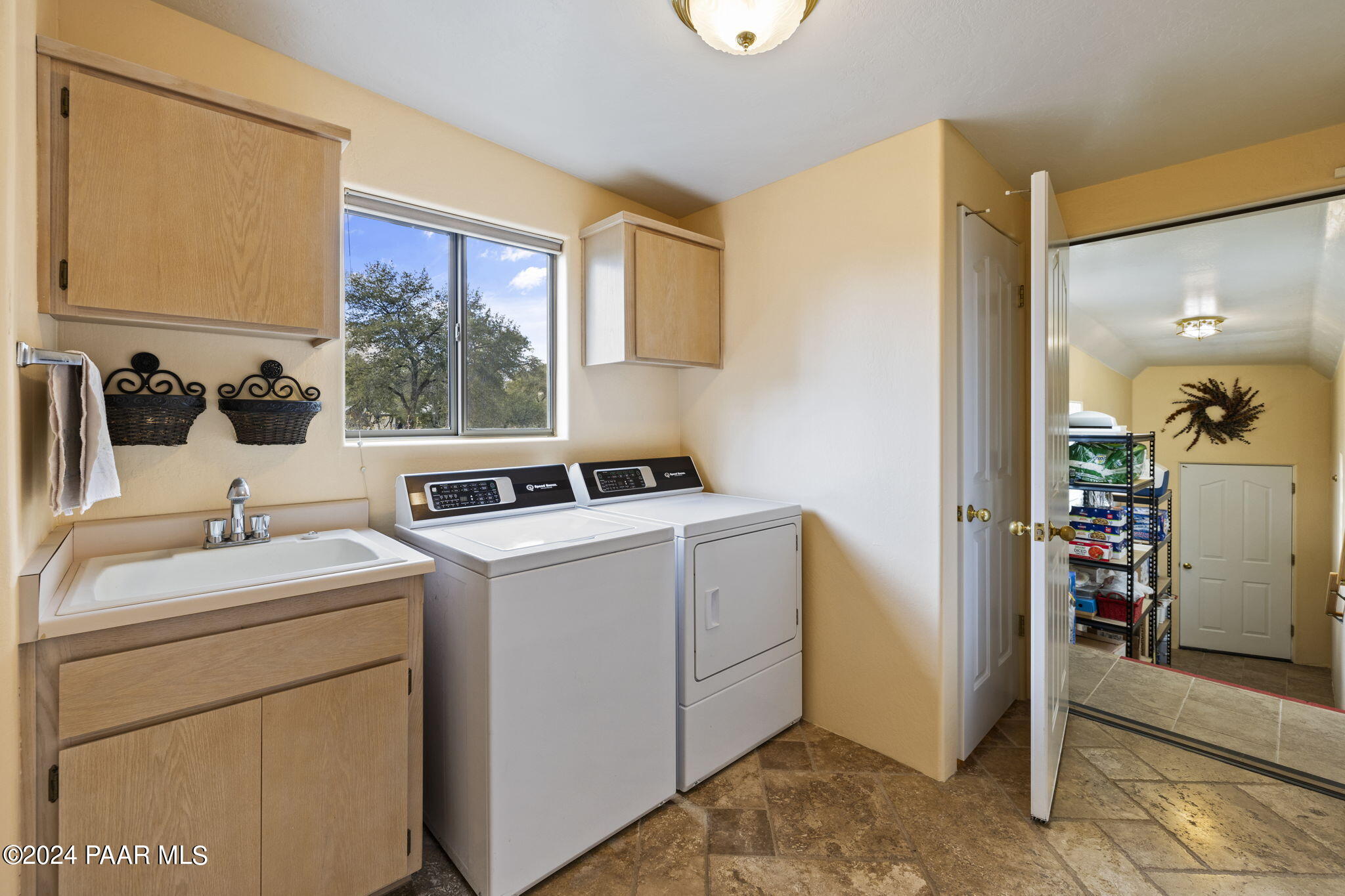 2147 West Post Oak Drive Prescott, AZ 86305 - Photo 39 of 59 a view of washer and dryer with bathroom in the background