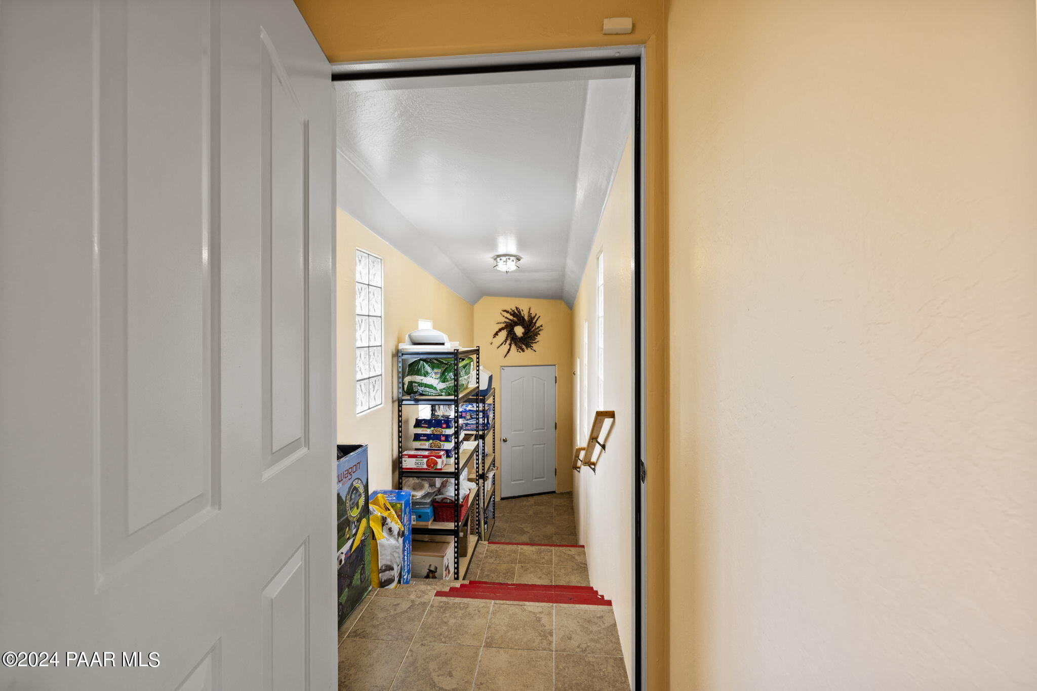 2147 West Post Oak Drive Prescott, AZ 86305 - Photo 40 of 59 a view of a hallway with furniture and a window