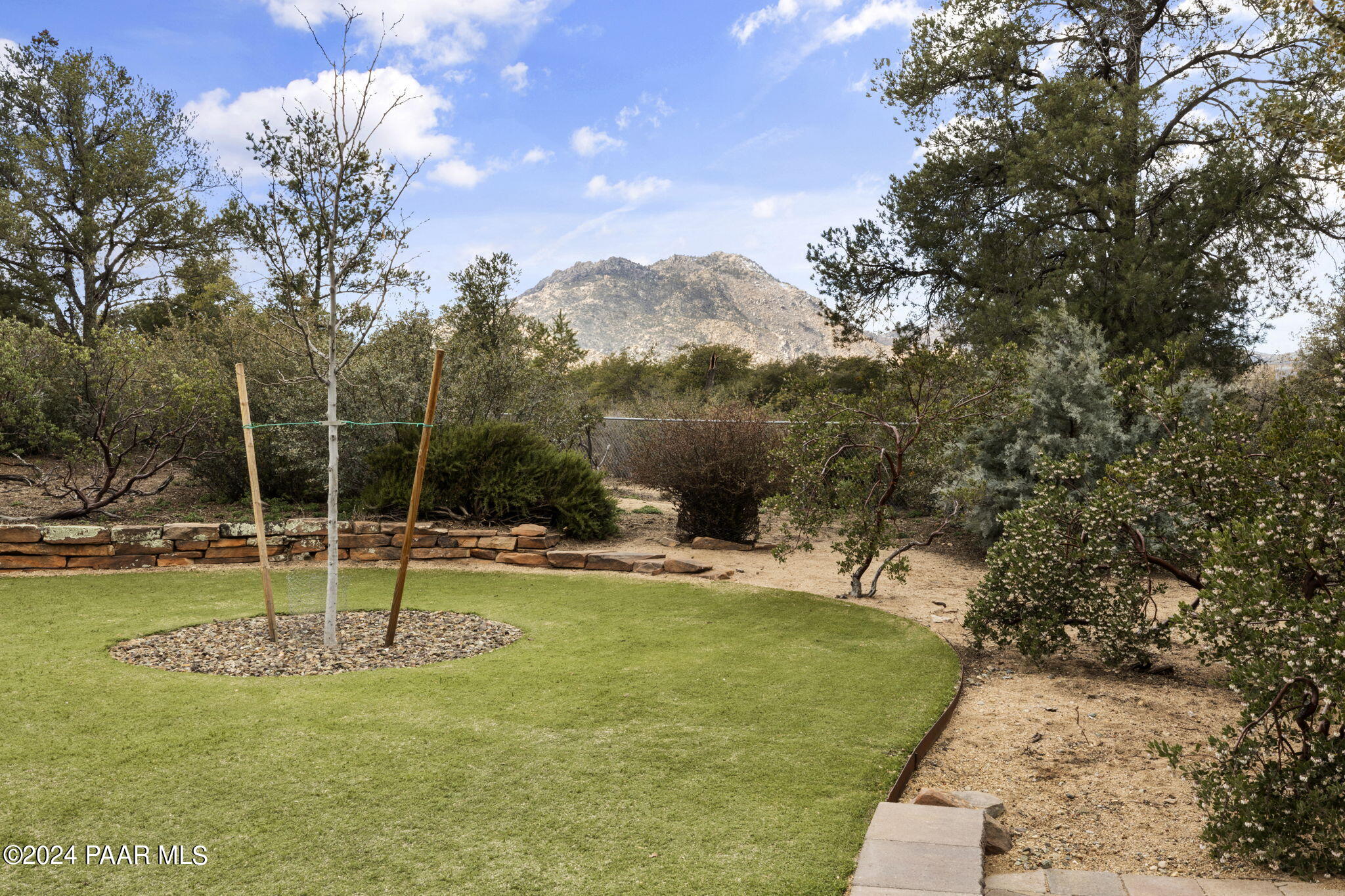 2147 West Post Oak Drive Prescott, AZ 86305 - Photo 41 of 59 a view of a swimming pool with a yard