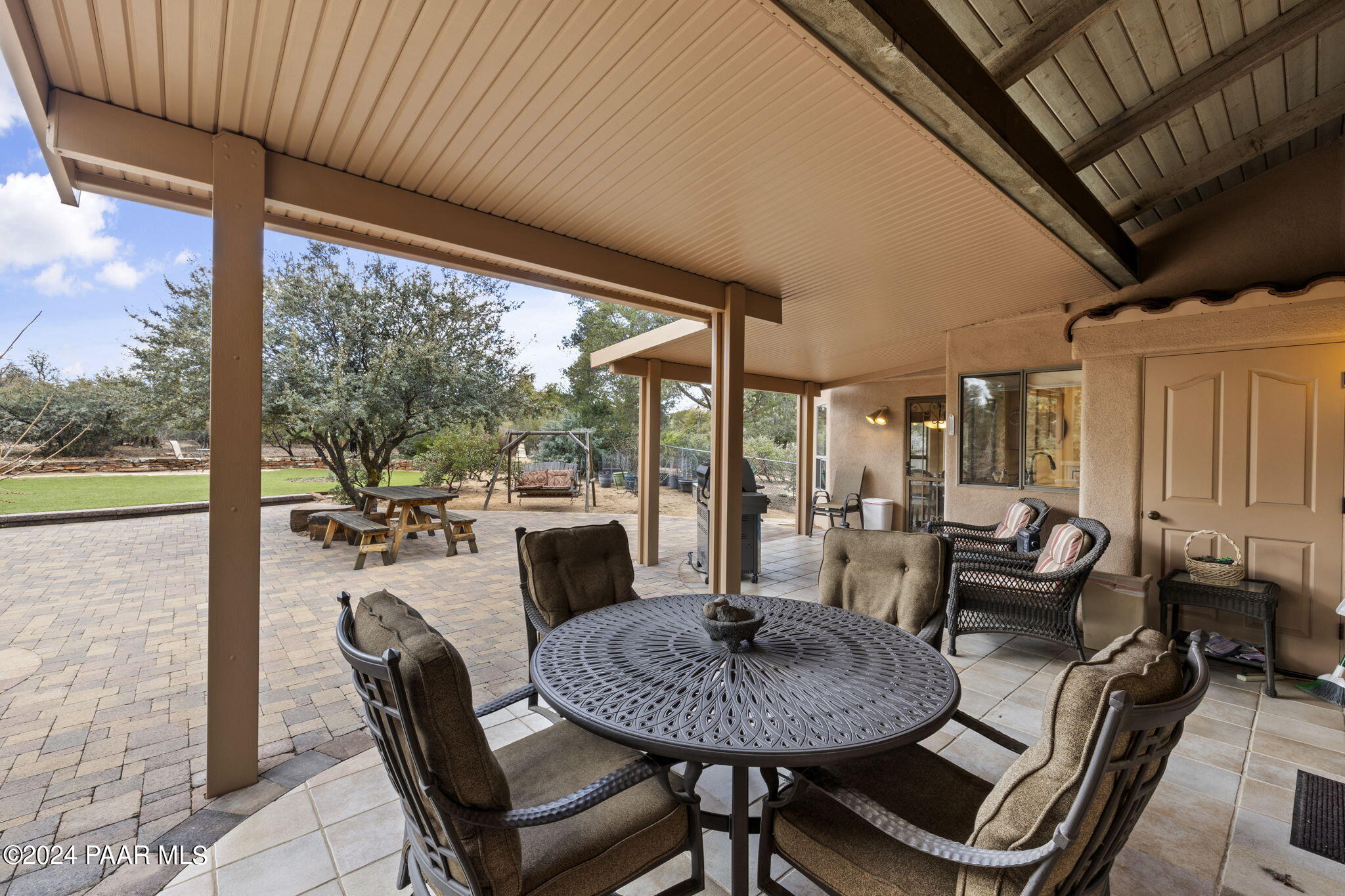 2147 West Post Oak Drive Prescott, AZ 86305 - Photo 42 of 59 a view of a dining room with furniture window and outside view
