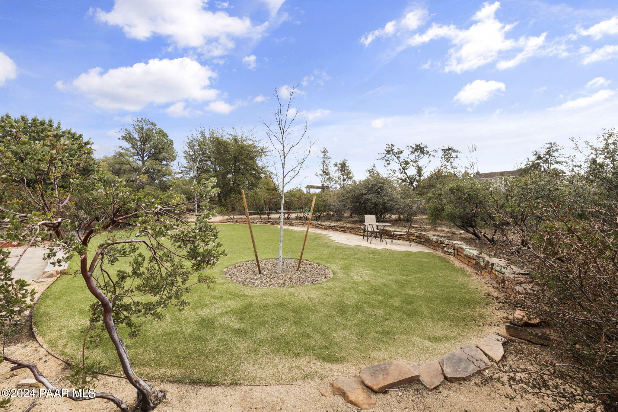 2147 West Post Oak Drive Prescott, AZ 86305 - Photo 48 of 59 a view of a swimming pool with a yard