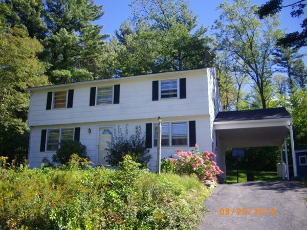 19 Paige Hill Road Brimfield, MA 01010 - Photo 2 of 2 front view of a house with a garden