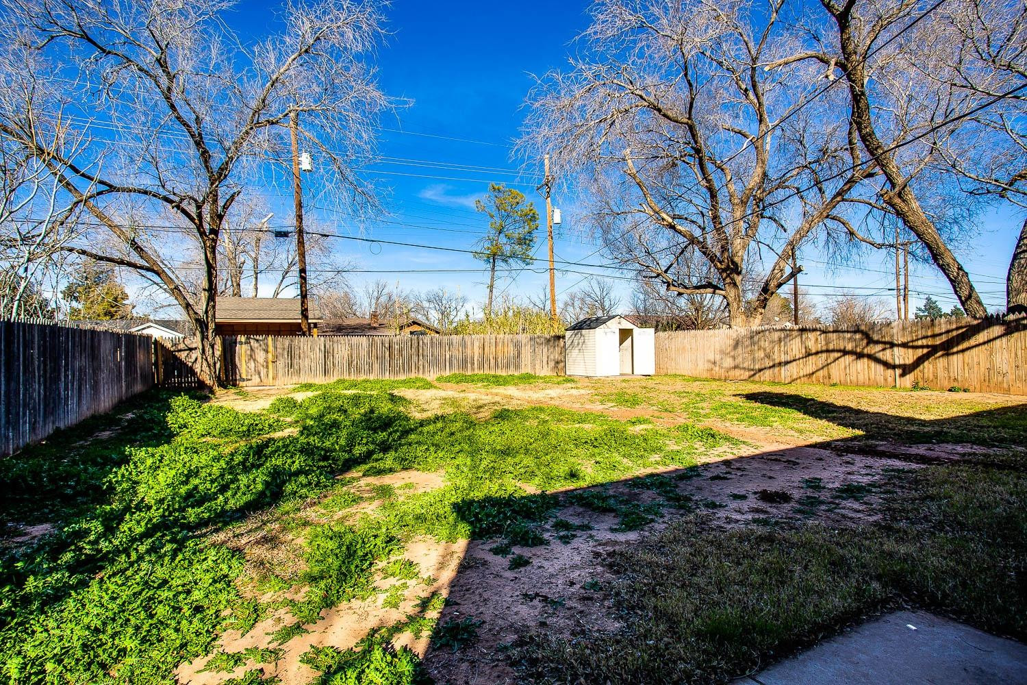 3414 32nd Street Lubbock, TX 79410 - Photo 11 of 11 a view of a yard with swimming pool