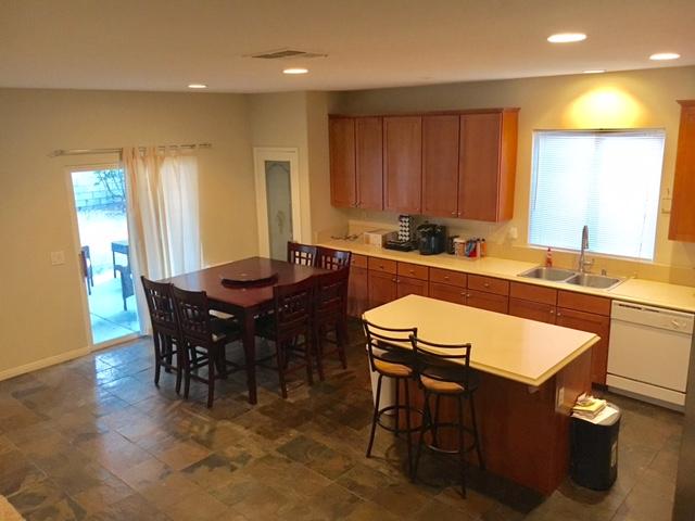 1844 Minter Way Lancaster, CA 93534 - Photo 4 of 15 a view of a a dining room with furniture window and wooden floor