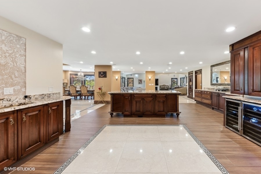 24575 Illinois Rte 59 Barrington, IL 60010 - Photo 12 of 60 a living room with stainless steel appliances furniture a kitchen view and a counter top space