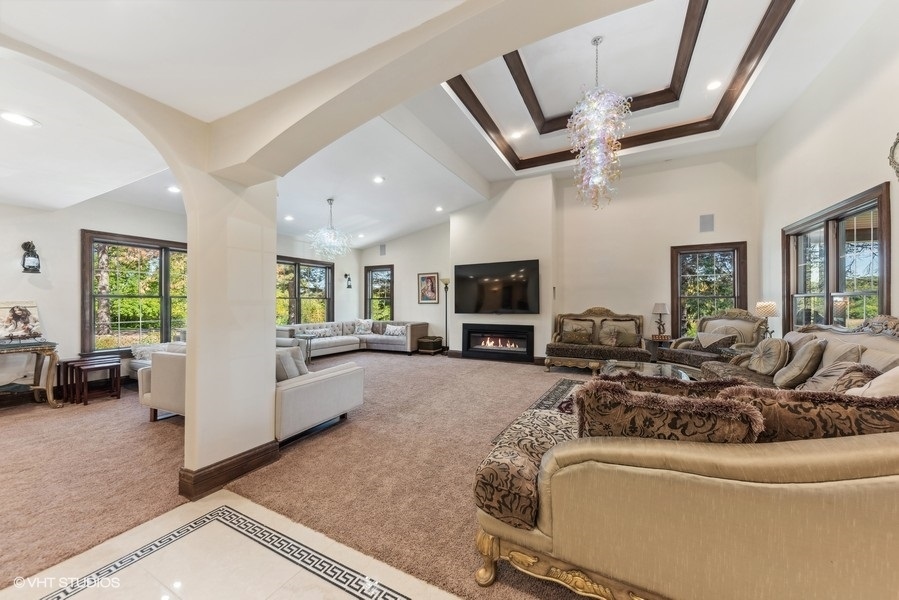 24575 Illinois Rte 59 Barrington, IL 60010 - Photo 16 of 60 a living room with furniture and a flat screen tv