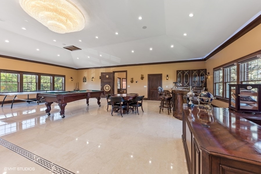 24575 Illinois Rte 59 Barrington, IL 60010 - Photo 20 of 60 a view of dining room and livingroom with lots of tables a large window and chairs