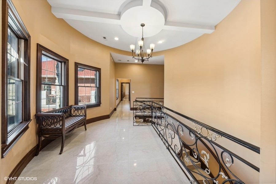24575 Illinois Rte 59 Barrington, IL 60010 - Photo 25 of 60 a living room with furniture and a chandelier