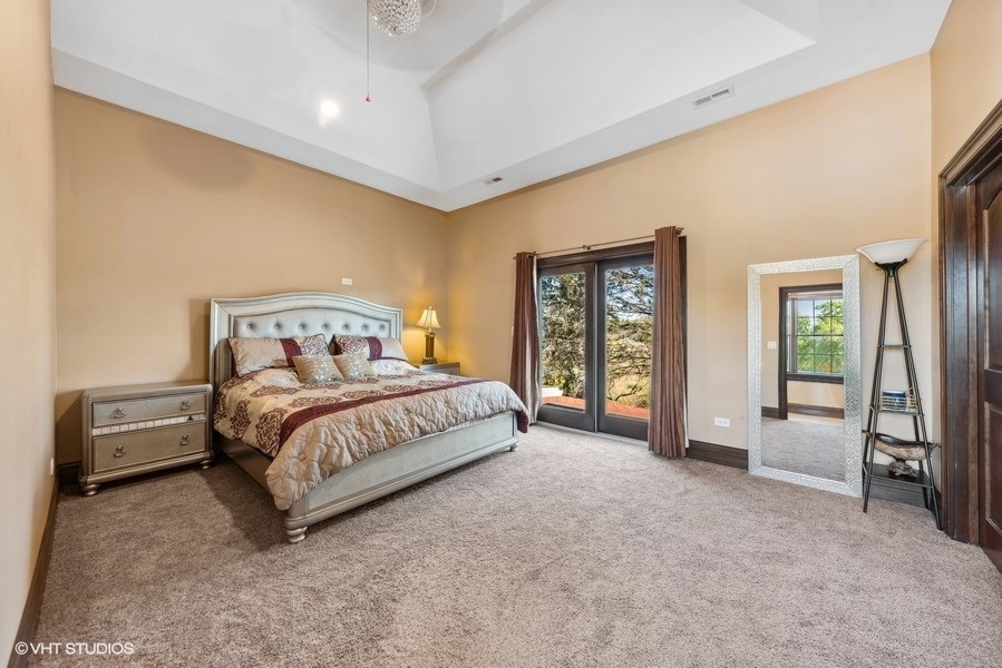 24575 Illinois Rte 59 Barrington, IL 60010 - Photo 26 of 60 a bedroom with a bed and a tv