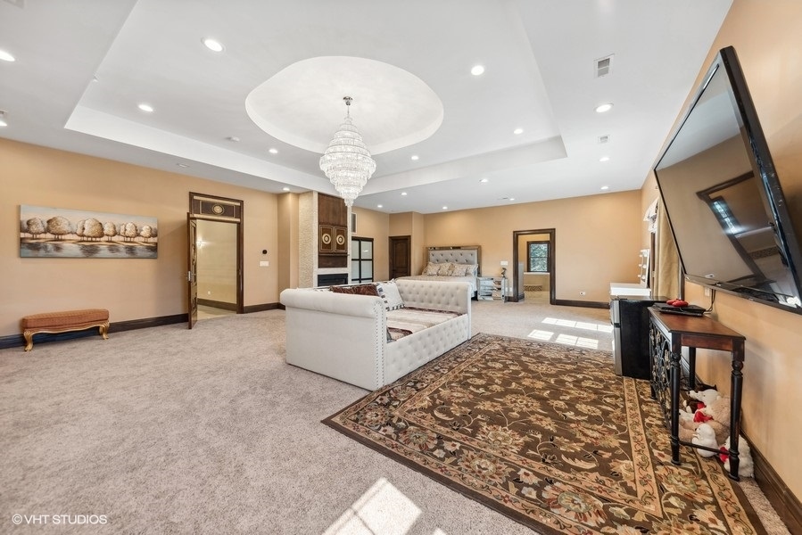 24575 Illinois Rte 59 Barrington, IL 60010 - Photo 29 of 60 a large room with wooden floor and furniture