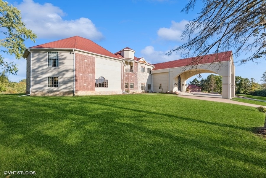 24575 Illinois Rte 59 Barrington, IL 60010 - Photo 3 of 60 a front view of a building with garden