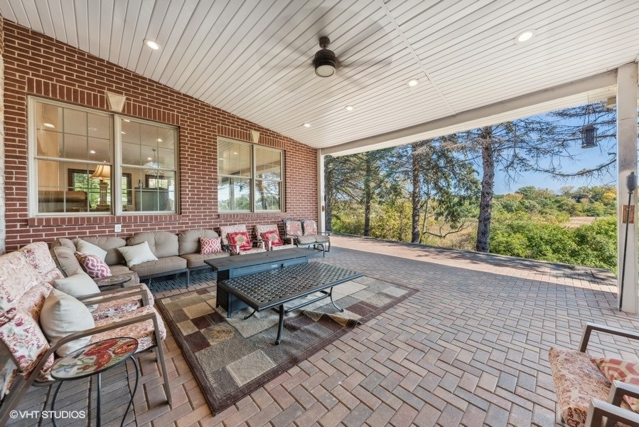24575 Illinois Rte 59 Barrington, IL 60010 - Photo 39 of 60 a living room with furniture and a large window