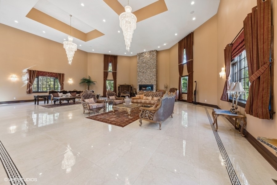 24575 Illinois Rte 59 Barrington, IL 60010 - Photo 7 of 60 a view of a living room and livingroom with furniture wooden floor a chandelier