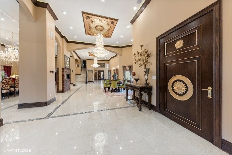 24575 Illinois Rte 59 Barrington, IL 60010 - Photo 9 of 60 a view of a hallway with washer and dryer