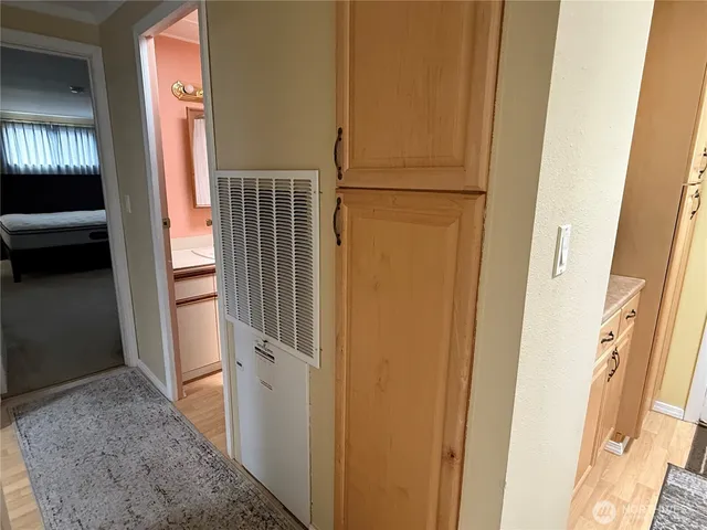 a view of a dining room with furniture and window