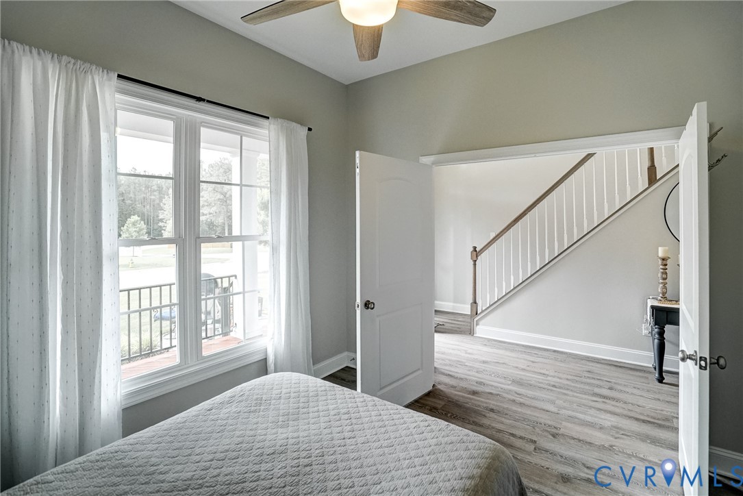 4669 Woburn Road Providence Forge, VA 23140 - Photo 23 of 78 a bedroom with a bed and a window with outer view