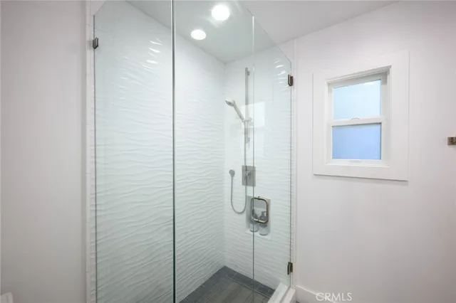 a living room with furniture and windows